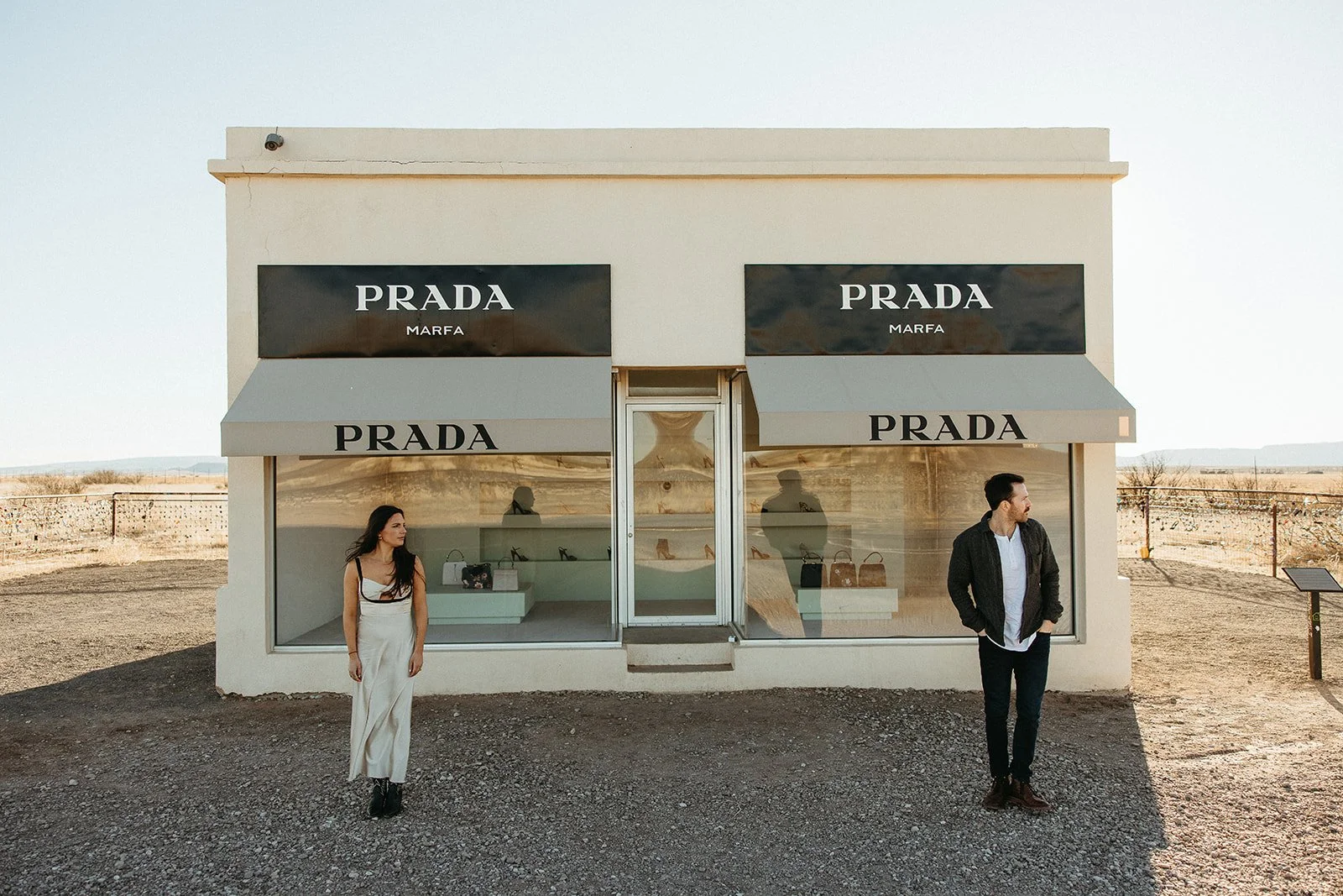 editorial inspired engagement session at Prada Marfa in West Texas